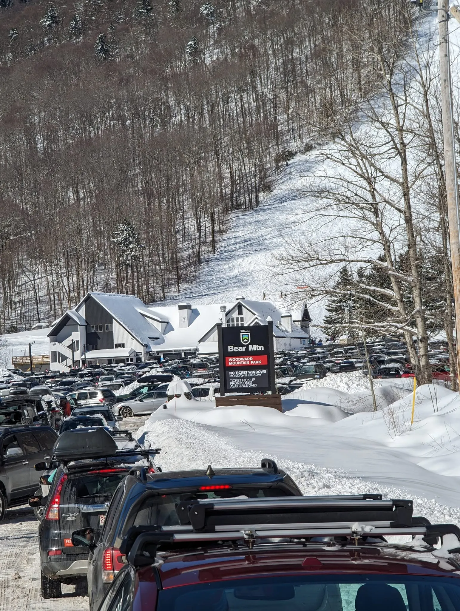 Cars packed into the Bear Mountain base area lot at Killington on a busy day